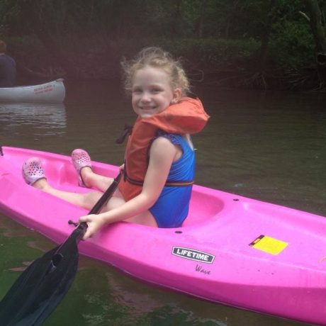 child on kayak